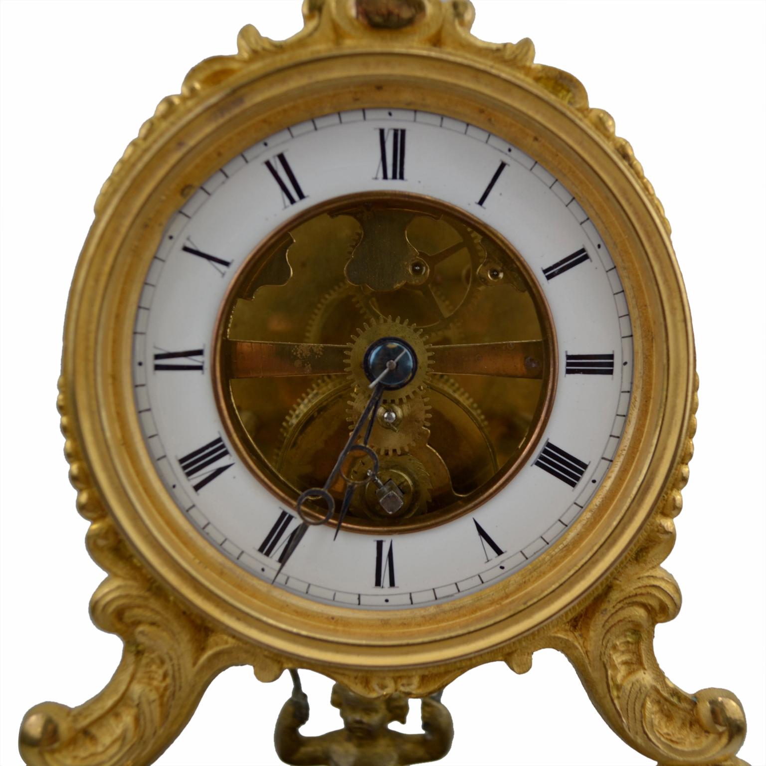 19th Century Glass Domed Gilt Bronze French Mystery Clock with a Swinging Putto 1