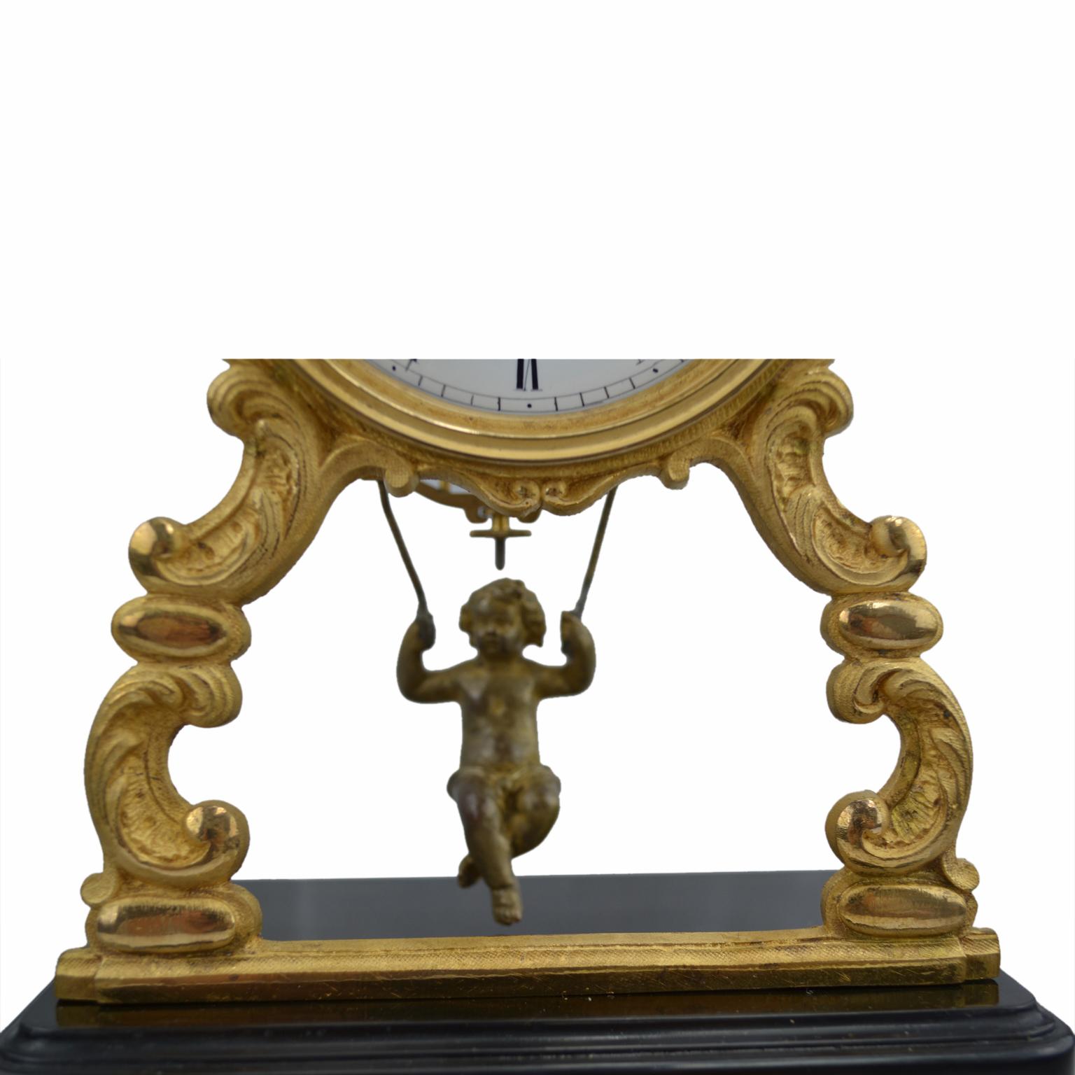19th Century Glass Domed Gilt Bronze French Mystery Clock with a Swinging Putto 2