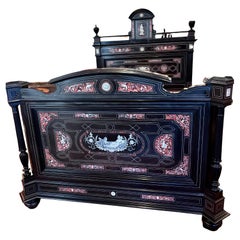 A 19 Century Renaissance Revival Ebony Veneered and Inlaid Bed After G.B.Gatti