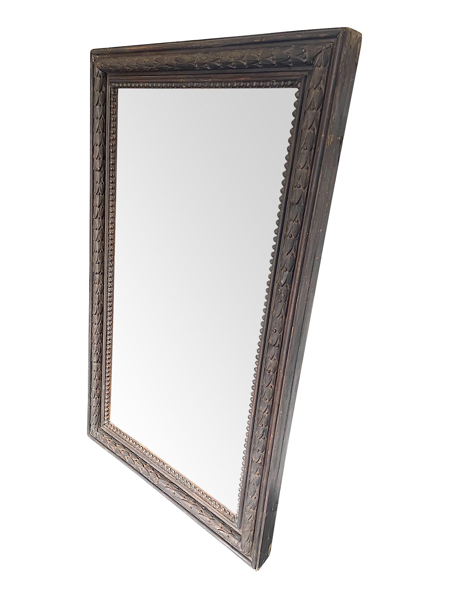 Neoclassical Revival 1900's French Ebonzied Acanthus Leaf Carved Wooden Mirror with Original Plate