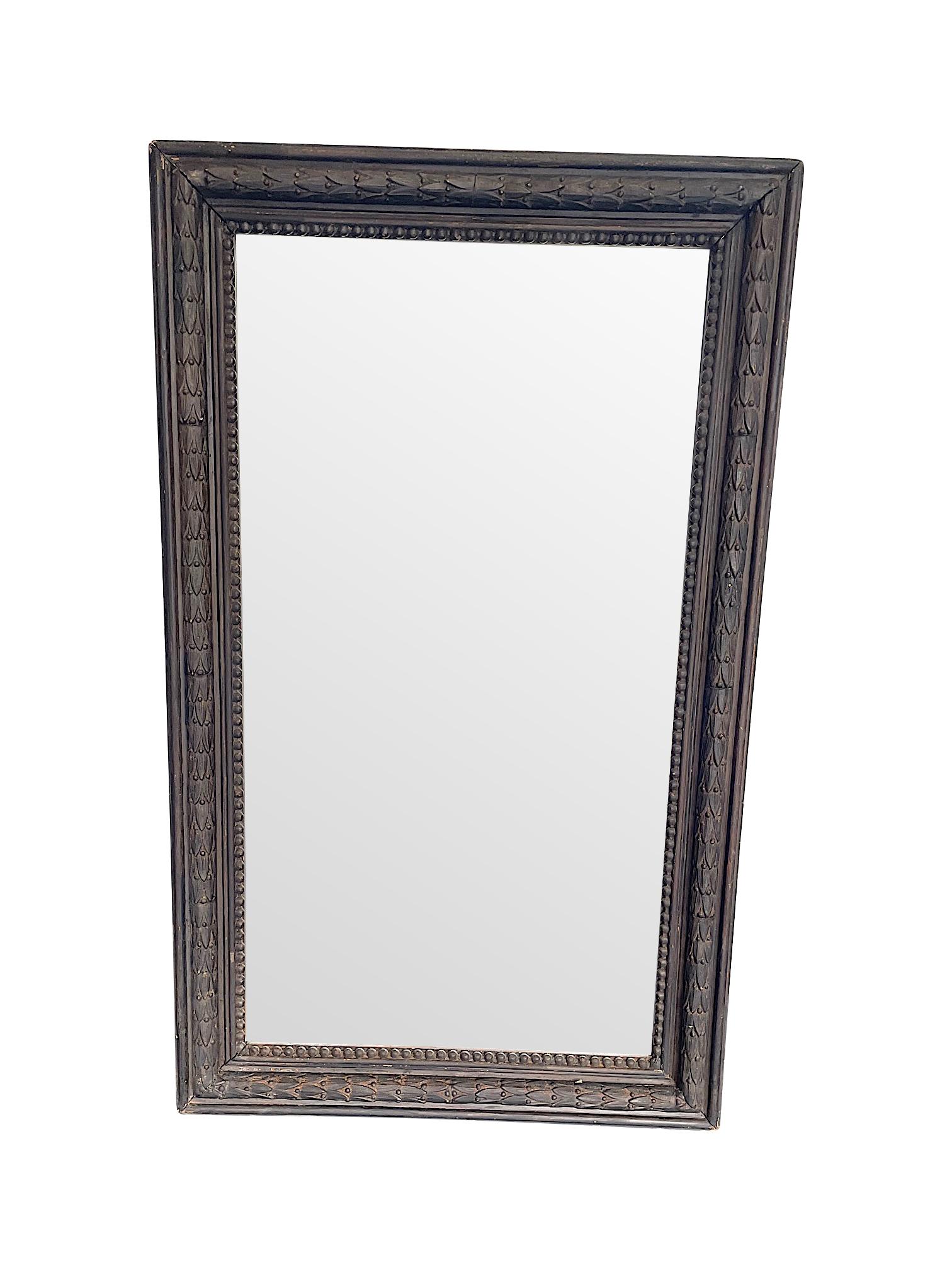 1900's French Ebonzied Acanthus Leaf Carved Wooden Mirror with Original Plate In Good Condition In London, GB