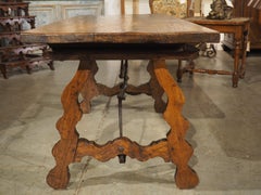 A 1900s Spanish Library Table Desk with Iron Stretchers, Shallow Frieze Drawers