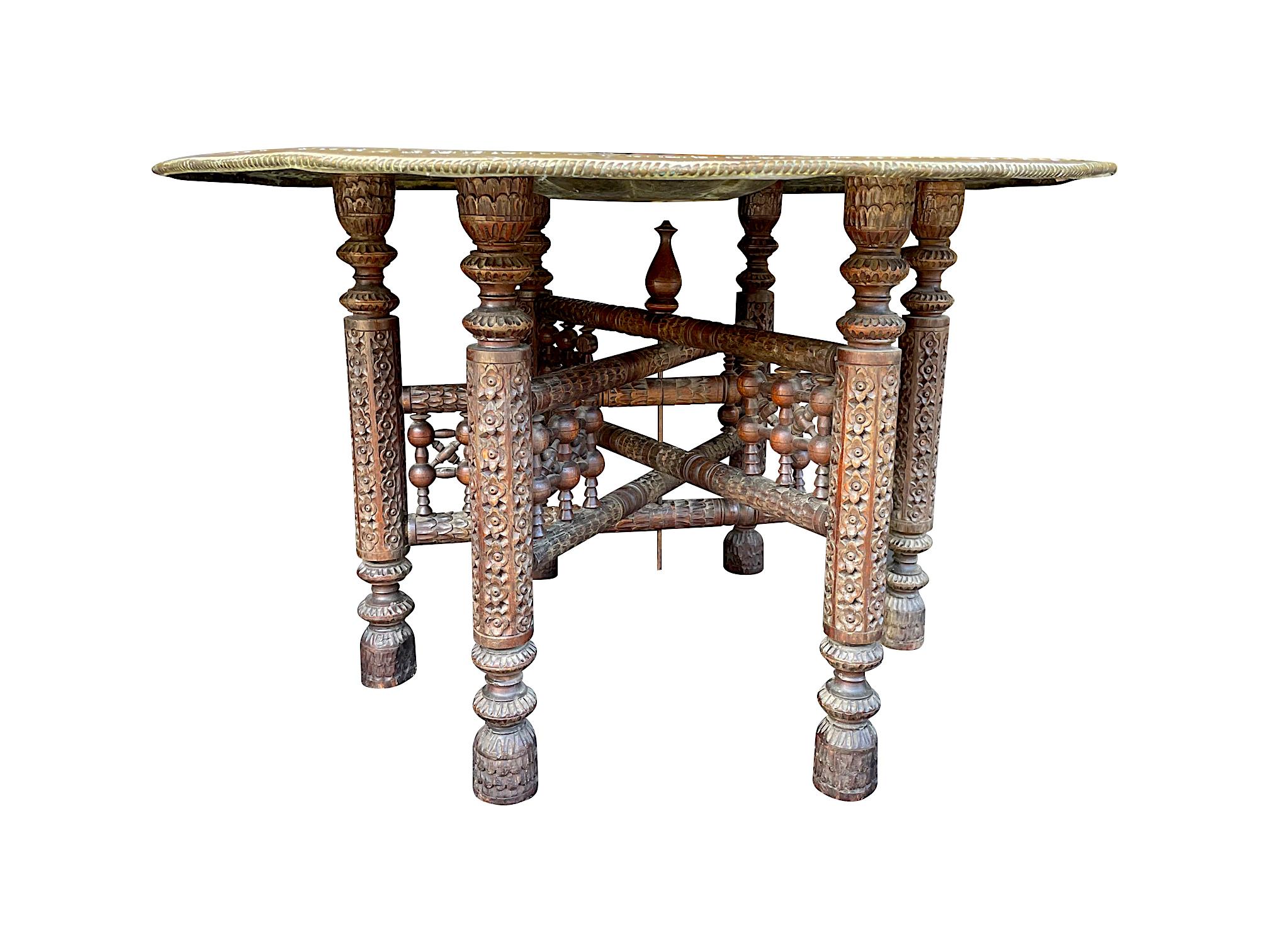 Early 20th Century 1920s Moroccan Carved Wooden Folding Table with Beautiful Hammered Brass Top