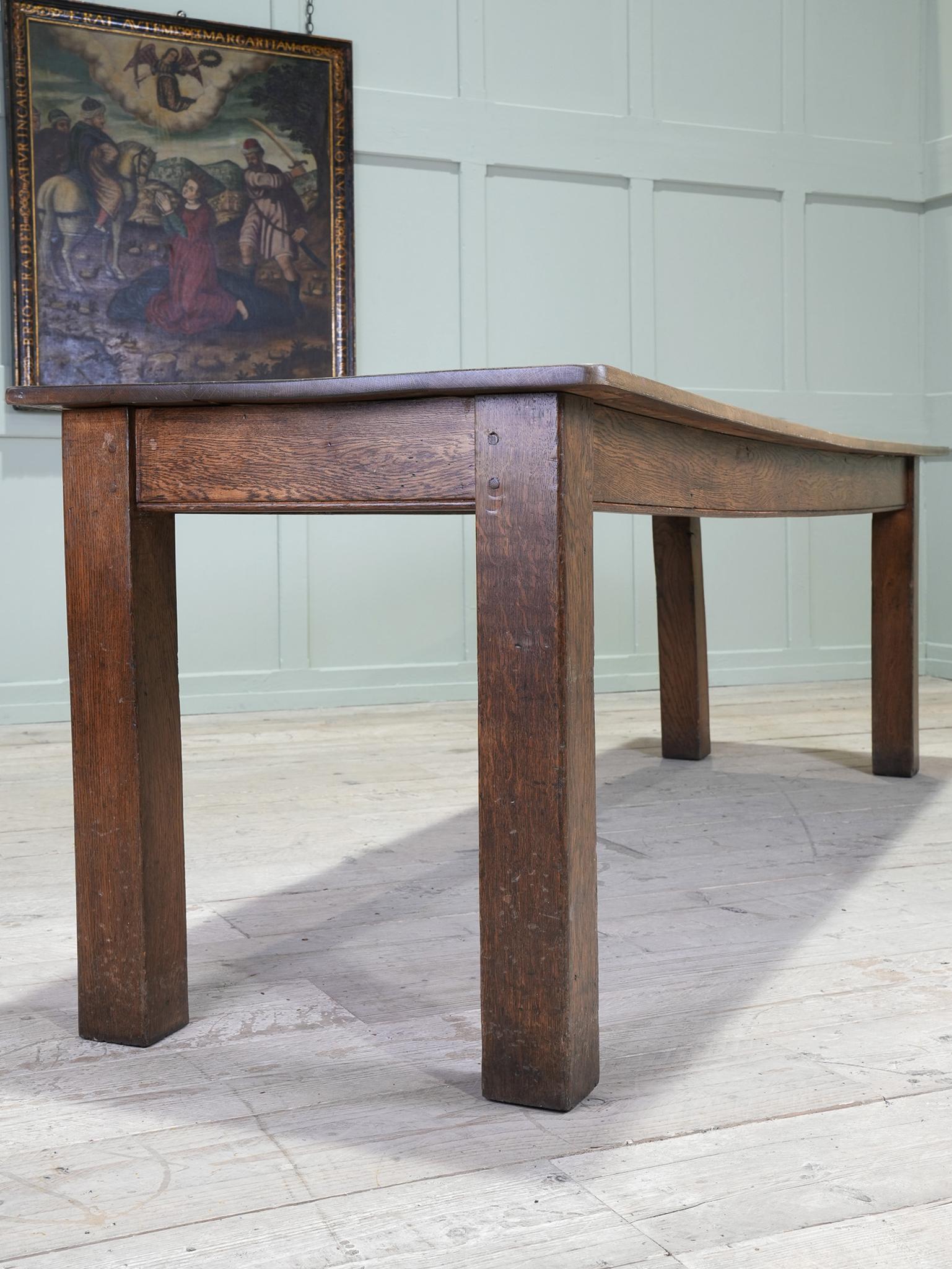 A substantial square rigged oak refectory table.

Untouched original order.

Provenance : Rydal Penrhos School, North Wales
