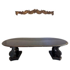 A 1920's Regency Style Ebonised Extending Dining Table