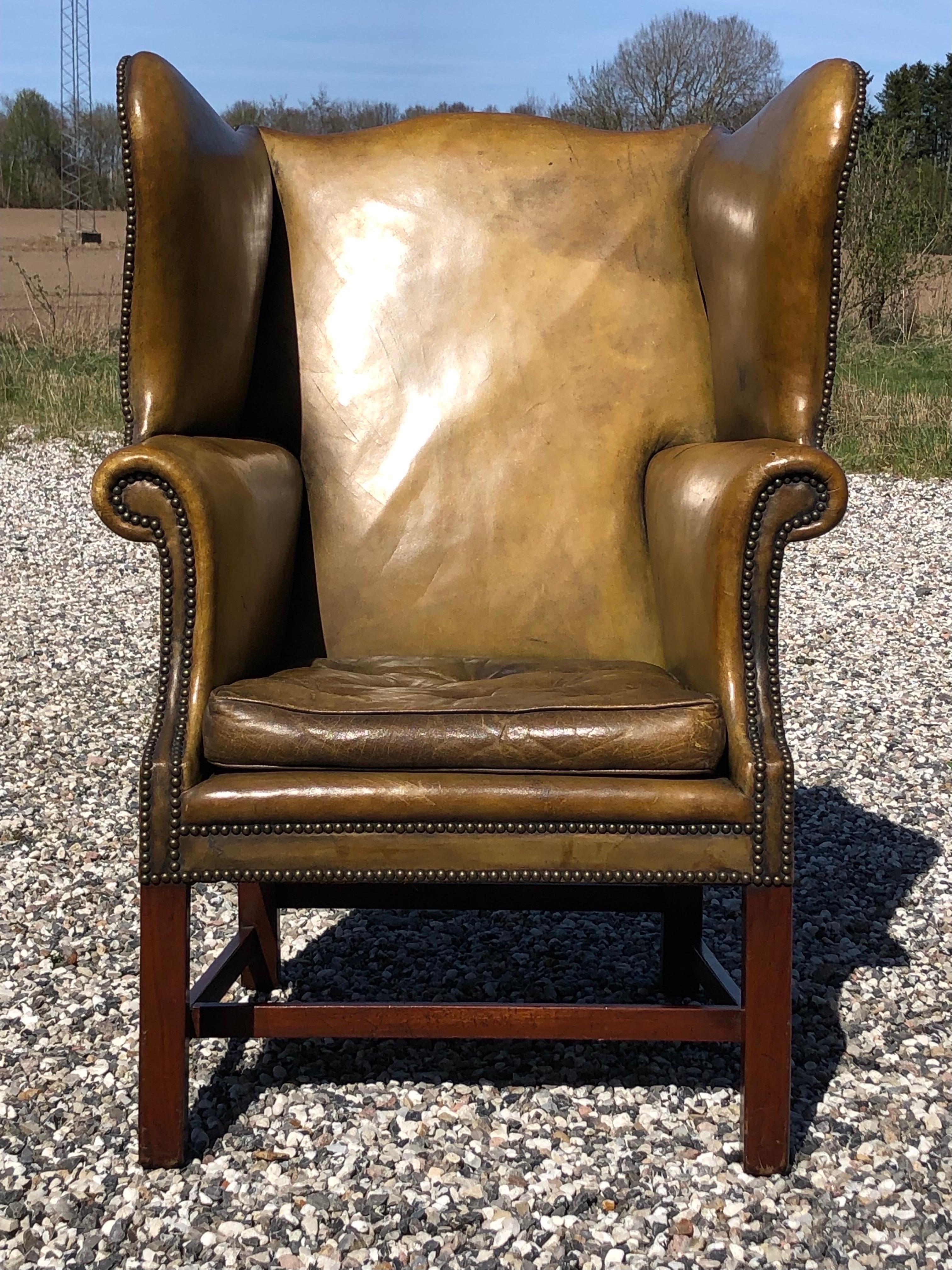 1920ties chair in green leather. Lose pillow filled with horsehair.