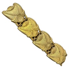 Bracelet en métal doré Art déco des années 1930