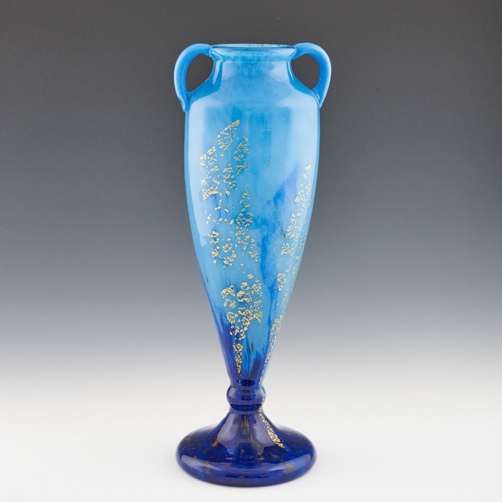 A 1925-1930's Daum Nancy glass vase in deep cobalt pale blue with gold foil inclusions. 
Incised signature on the foot as shown.