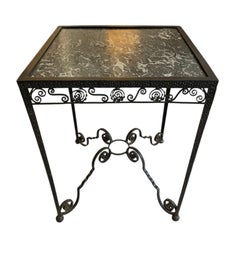 A 1930s,  French,  wrought iron,  marble topped side table