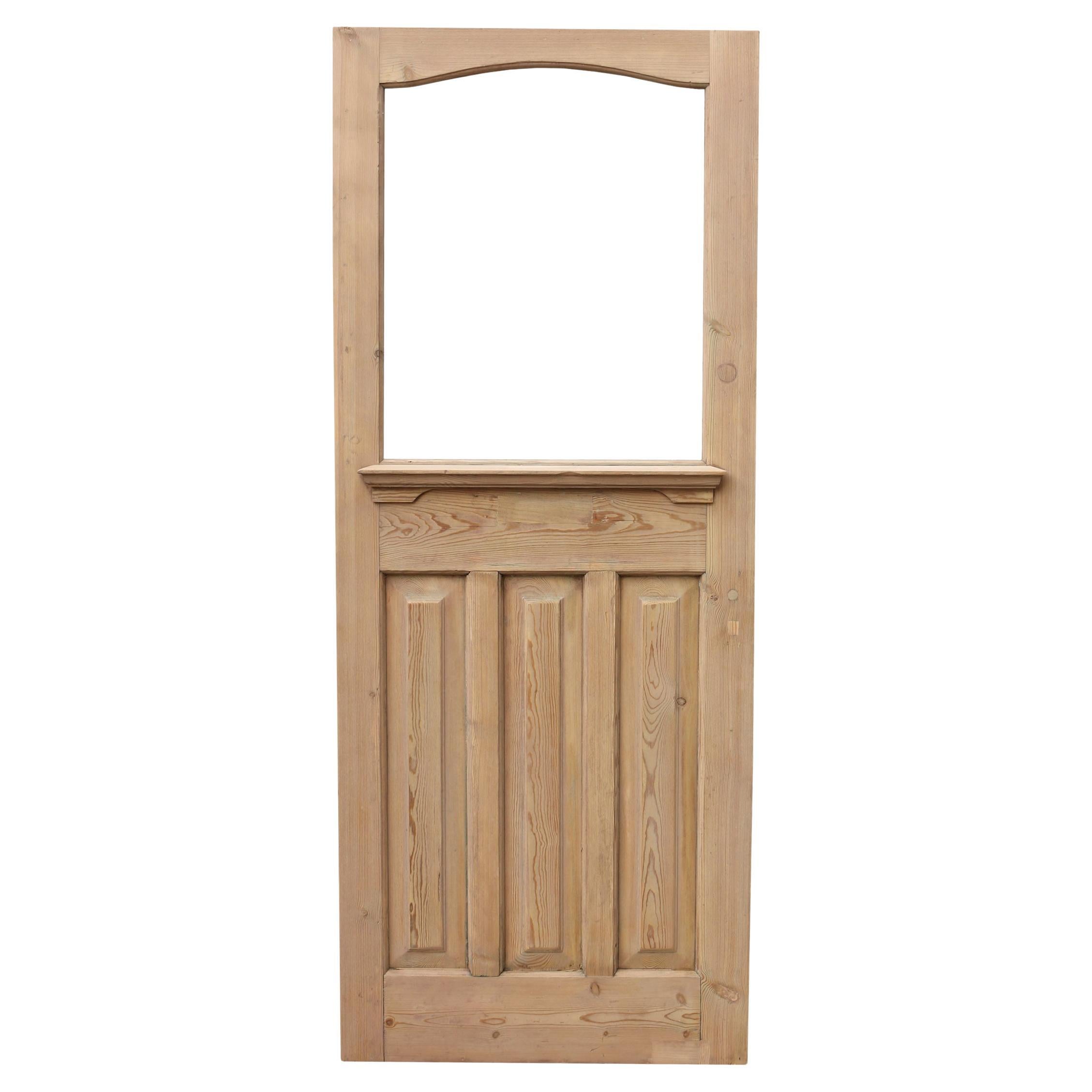 Puerta de entrada de pino acristalada de los años 30