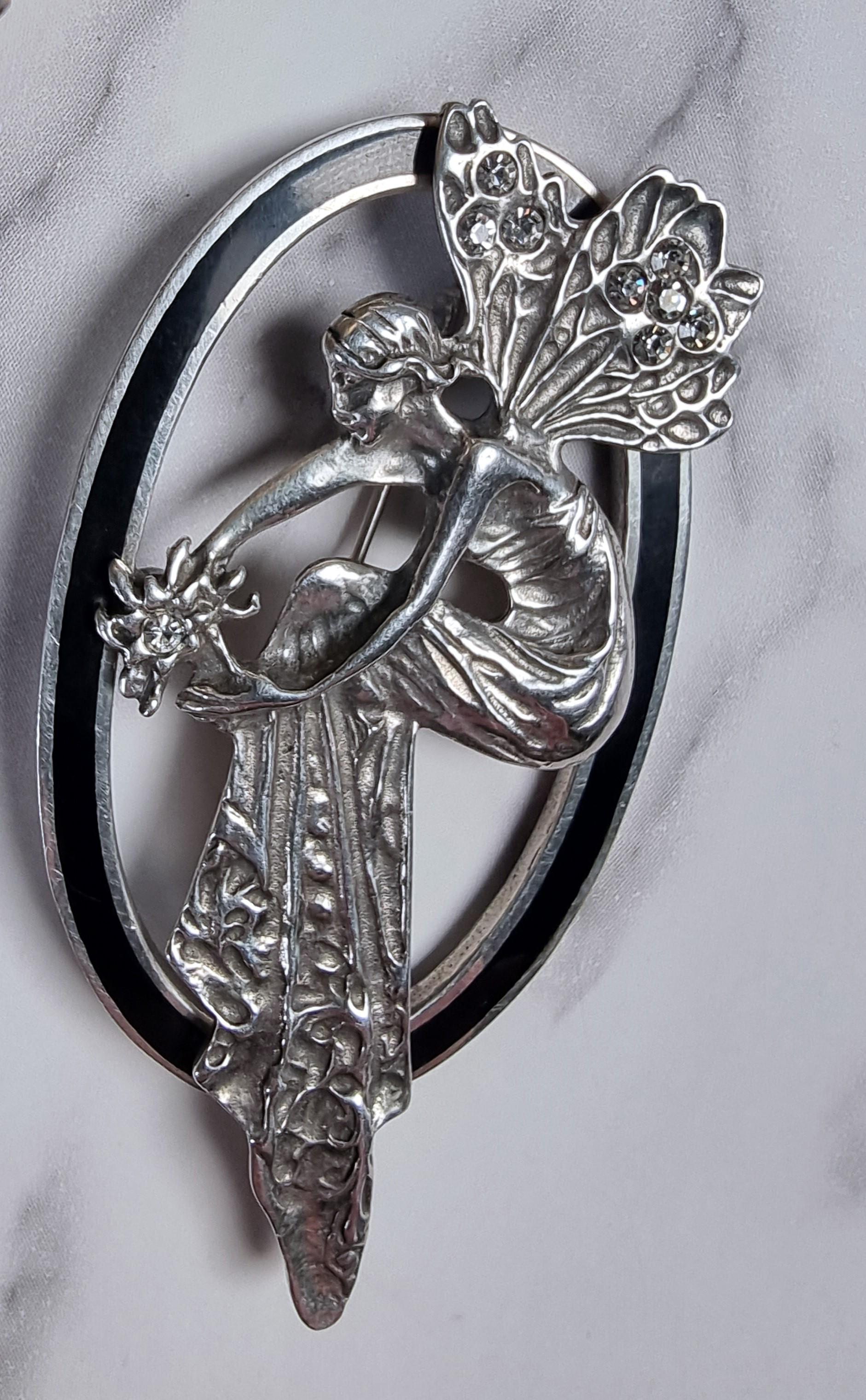 Enameled A 1930s silver and black enamel fairy brooch For Sale