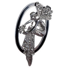 Vintage A 1930s silver and black enamel fairy brooch