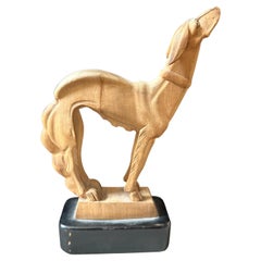 A 1930s Stylish Art Deco Hand-Carved Figure of a Greyhound