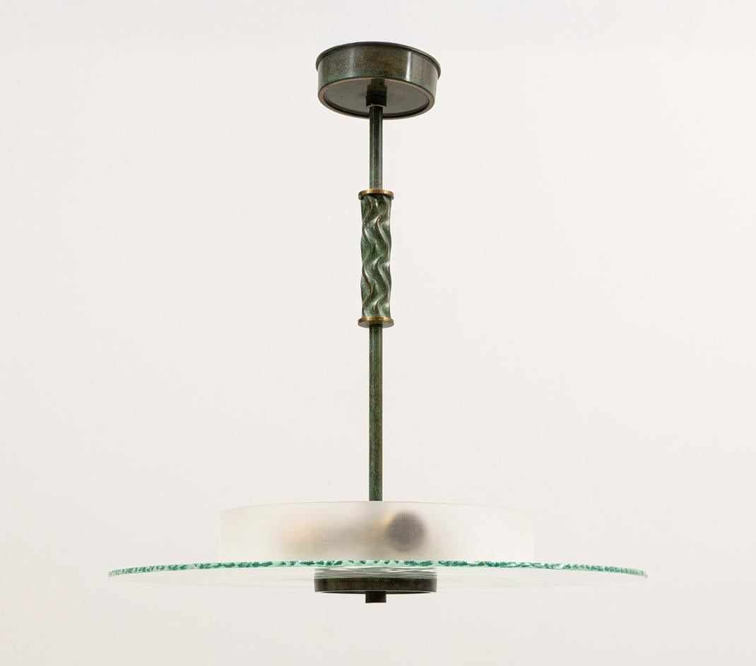 Mid-20th Century A 1930s Swedish Art Deco Pendant with Raw Glass Edge For Sale