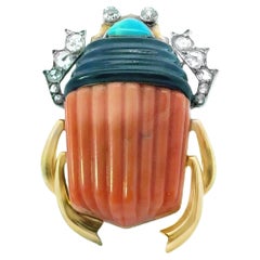 A 1936 Cartier Scarab Coral Gem Set Brooch . Signed Cartier Paris