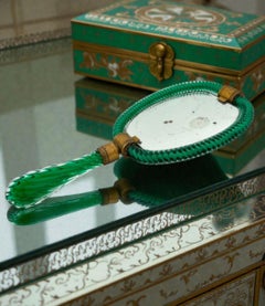A 1940s Art Deco Italian green Murano glass hand mirror by Barovier and Toso
