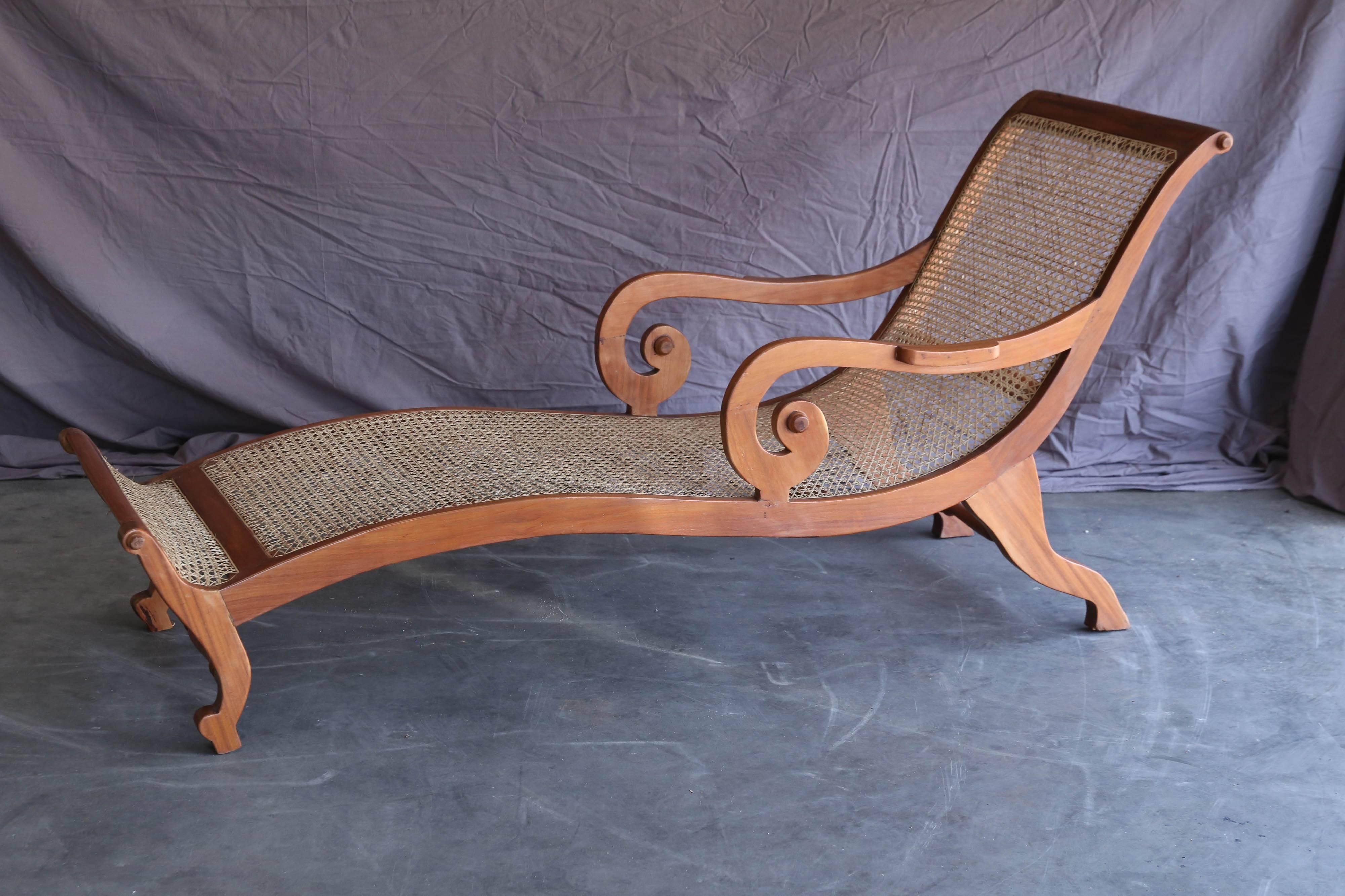 This elegant daybed was designed and made by some of the finest wood crafters in Sri Lanka. It was made with comfort in mind. Very fine Borneo cane and teak wood were used in making this custom-made daybed. The cane can last several decades if it is