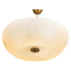 A 1940s Frosted Glass Pendant with Flower Motif