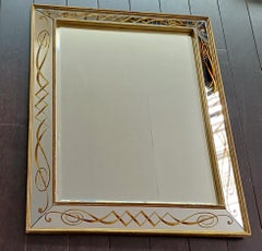 A 1940's Italian eglomise wall mirror
