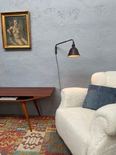A 1950s Danish Brass And Bakelite Telescopic Wall Lamp