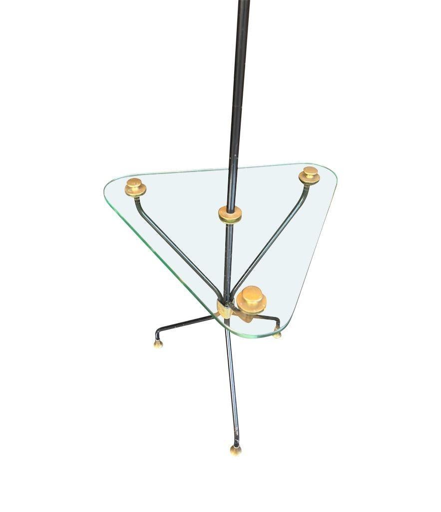 A 1950s French black lacquer and brass tripod floor lamp with glass table For Sale 1