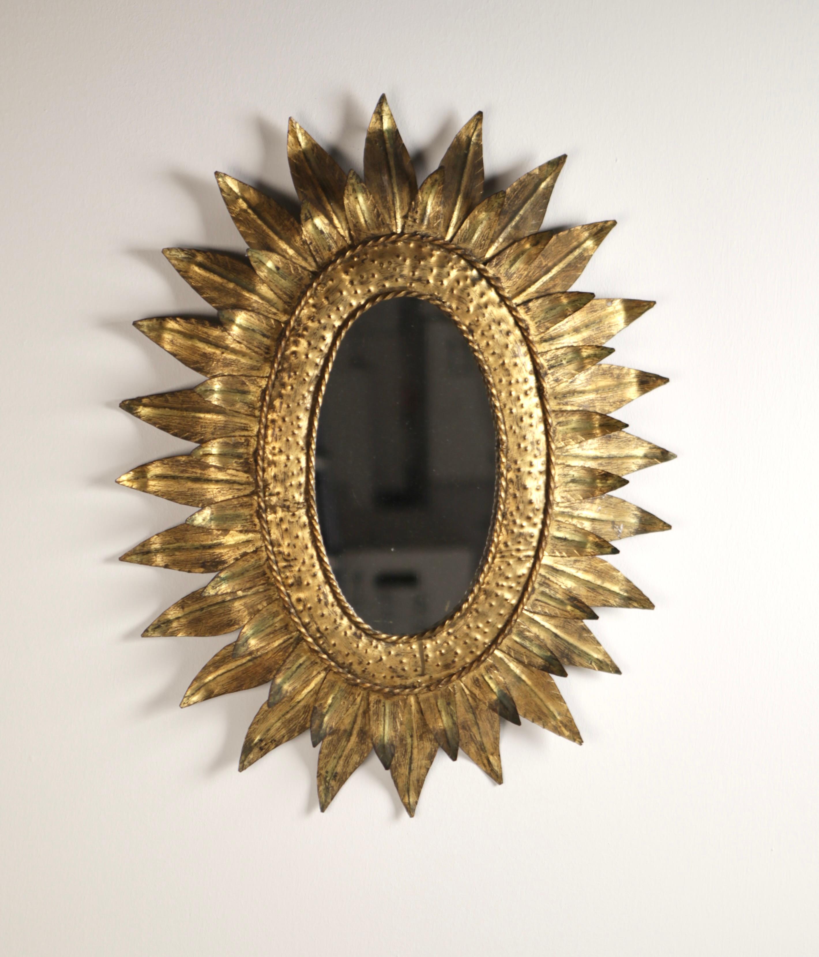 A 1950s Gilded Metal Sunburst Mirror. In Good Condition In Berlin, DE