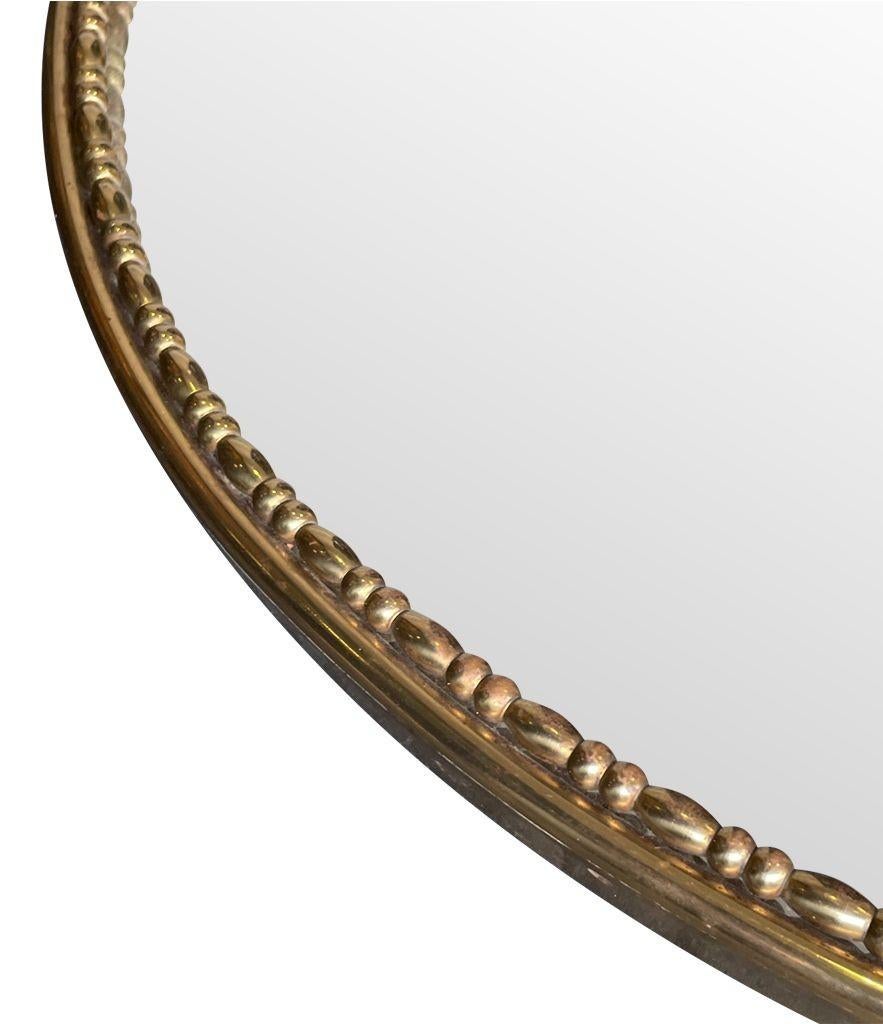 1950s Italian Oval Brass Framed Mirror with Beaded Edge Detail In Good Condition For Sale In London, GB