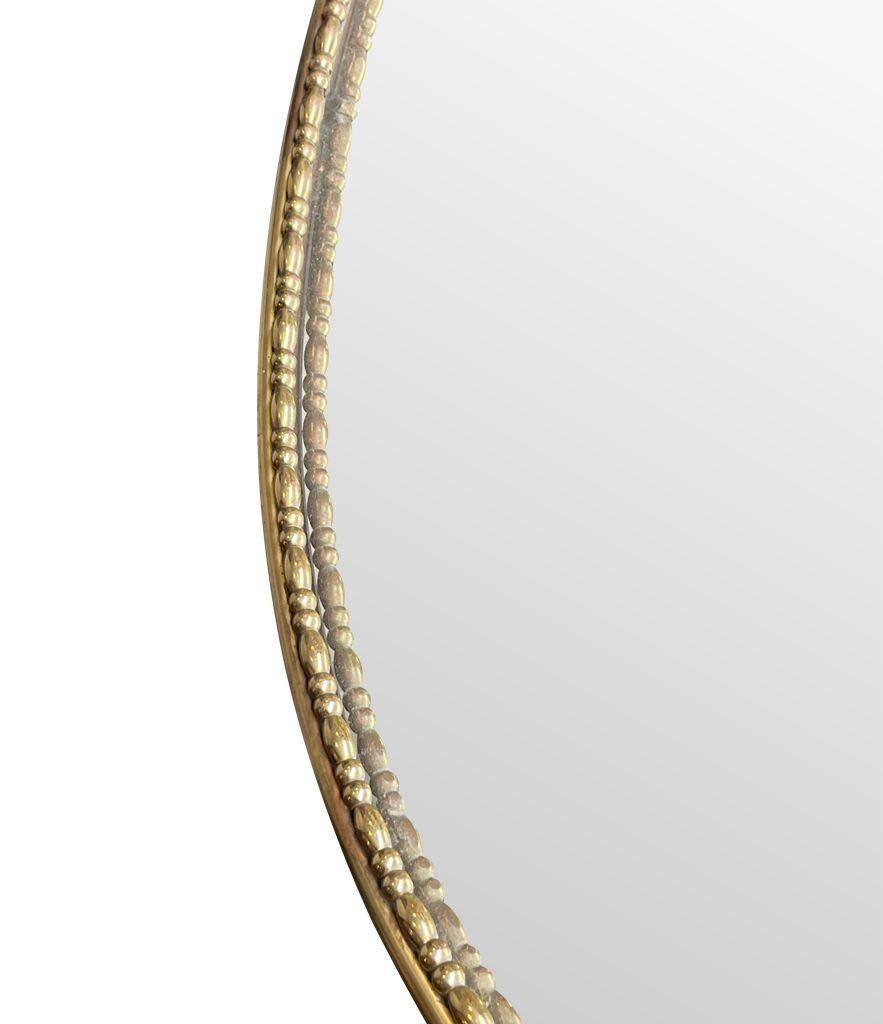 Mid-Century Modern 1950s Italian Oval Brass Framed Mirror with Beaded Edge Detail For Sale