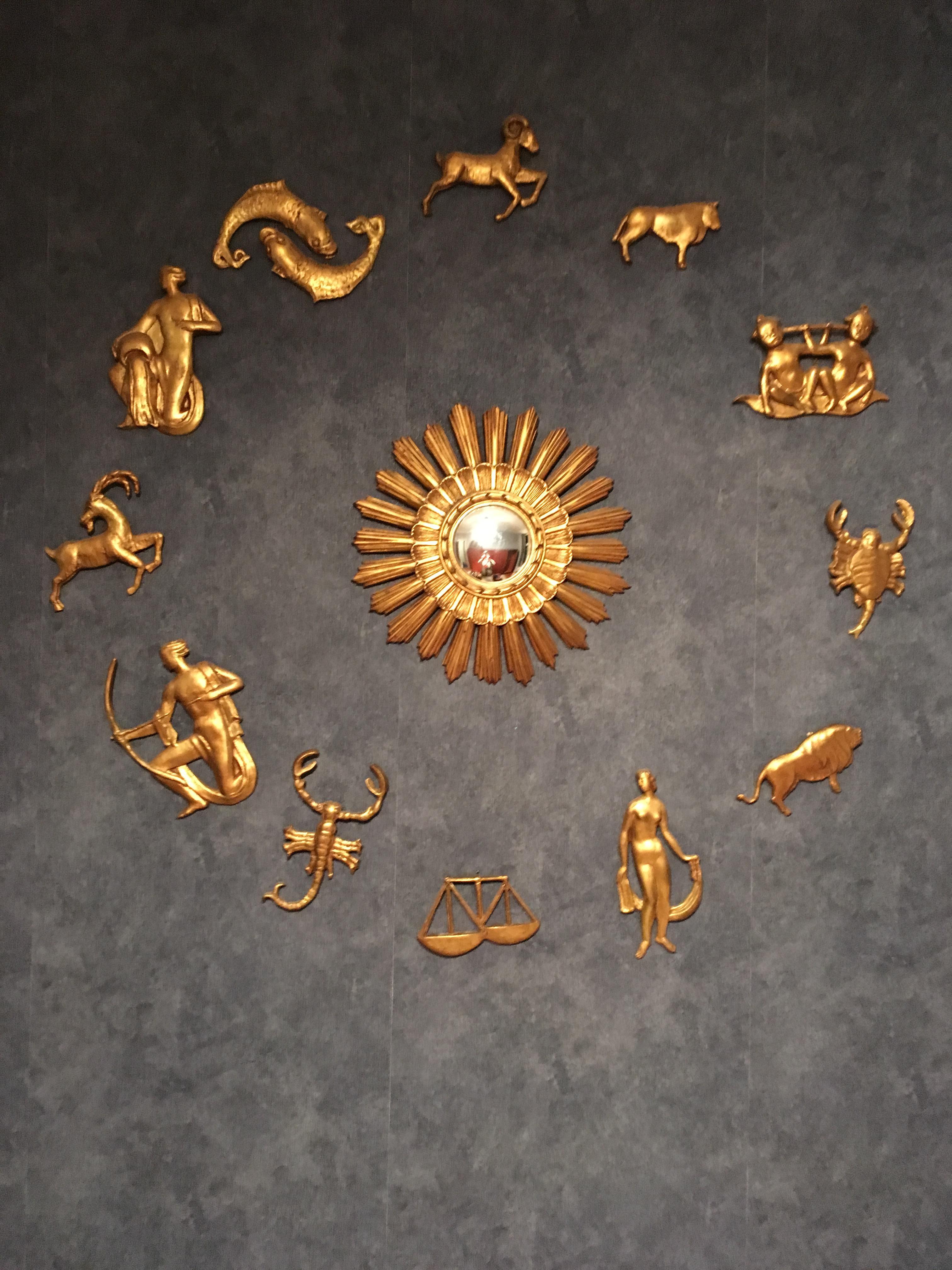 Stucco 1950s Italian Sunburst Mirror with Depicting the Gilt Zodiac Signs