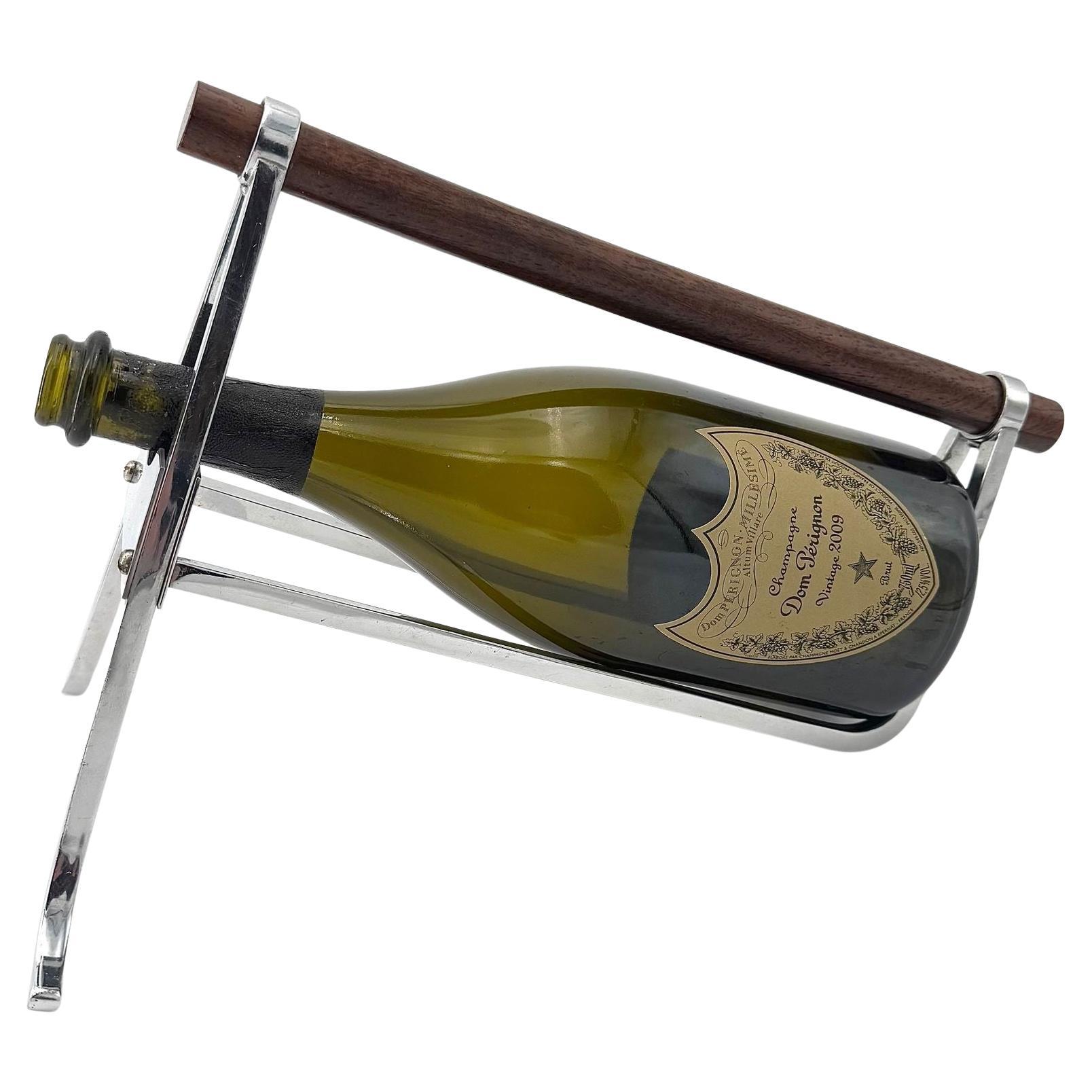 A 1950s Jaques Adnet chrome and walnut bottle holder for Christolfe For Sale