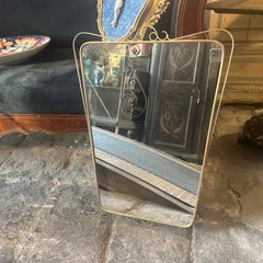 A 1950s Mid-Century Modern Brass Italian Wall Mirror in the Manner of Gio Ponti