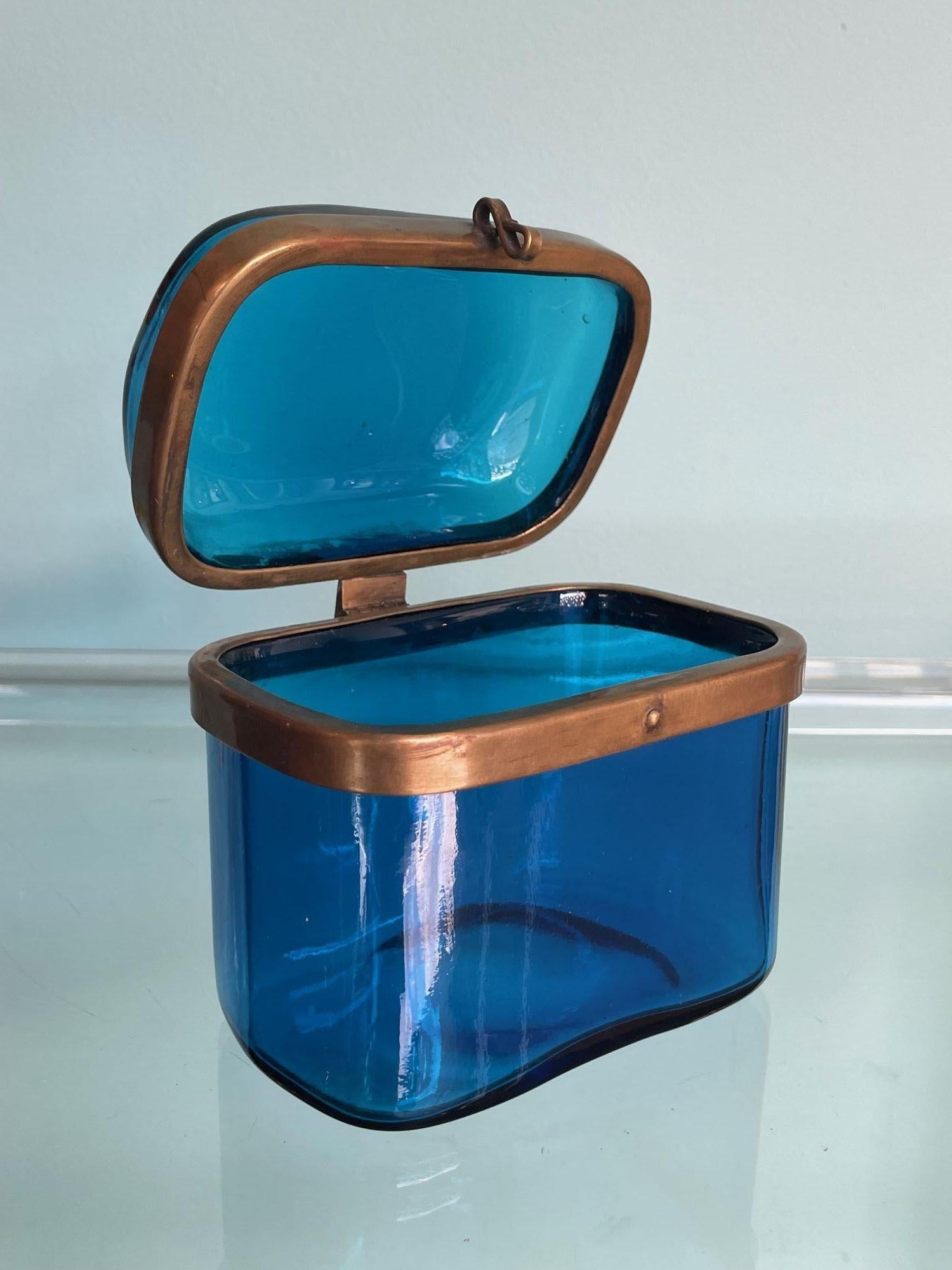 A 1950s Murano blue glass Jewellery box with brass clasp and rim