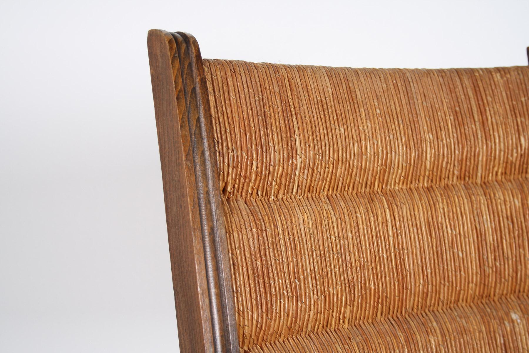 Fauteuil tire-bouchon en Oak des années 1950 avec assise en paille attribué à Charles Dudouyt en vente 5