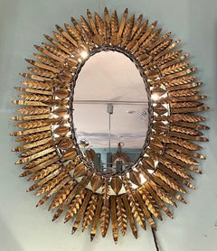 1950s Spanish Oval Wrought Iron Back Lit Sunburst Mirror