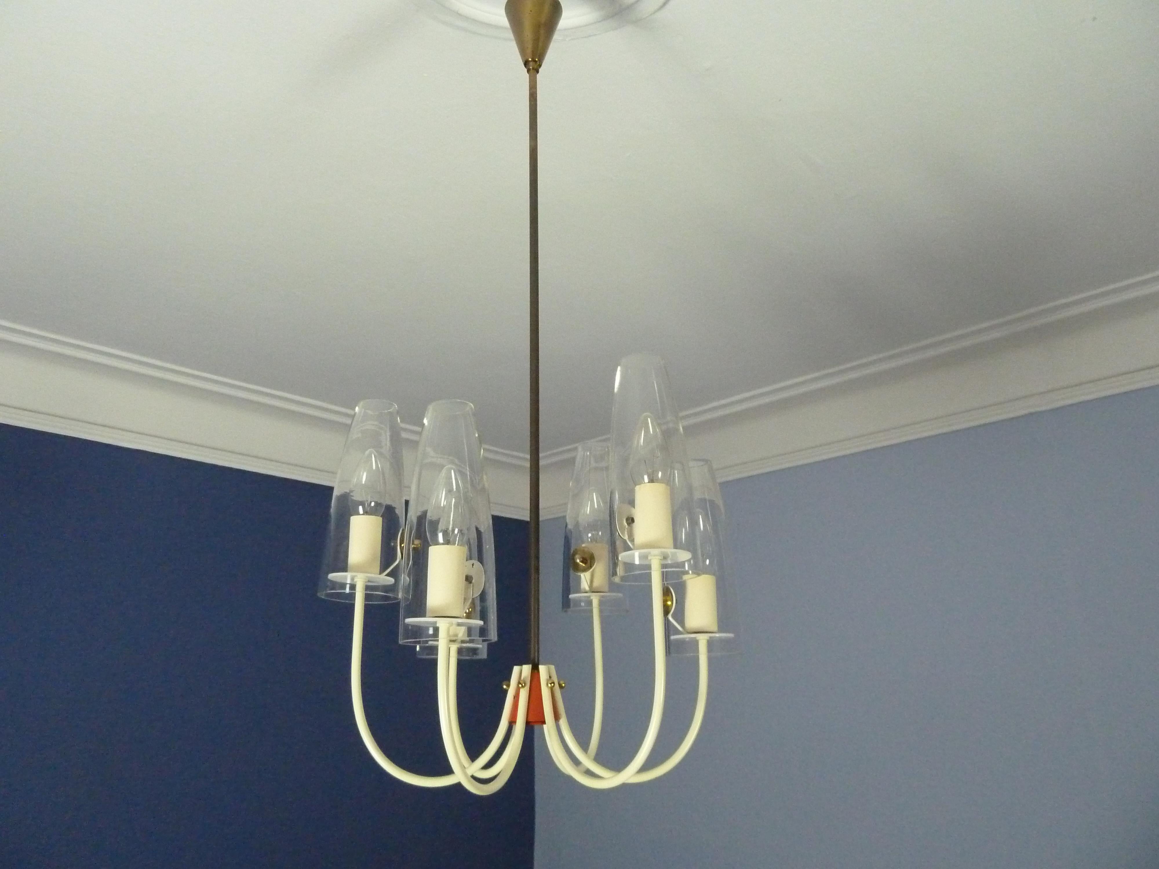 An elegant midcentury chandelier with nice blown glass lampshades from Gebrüder Cosack, Germany.


    