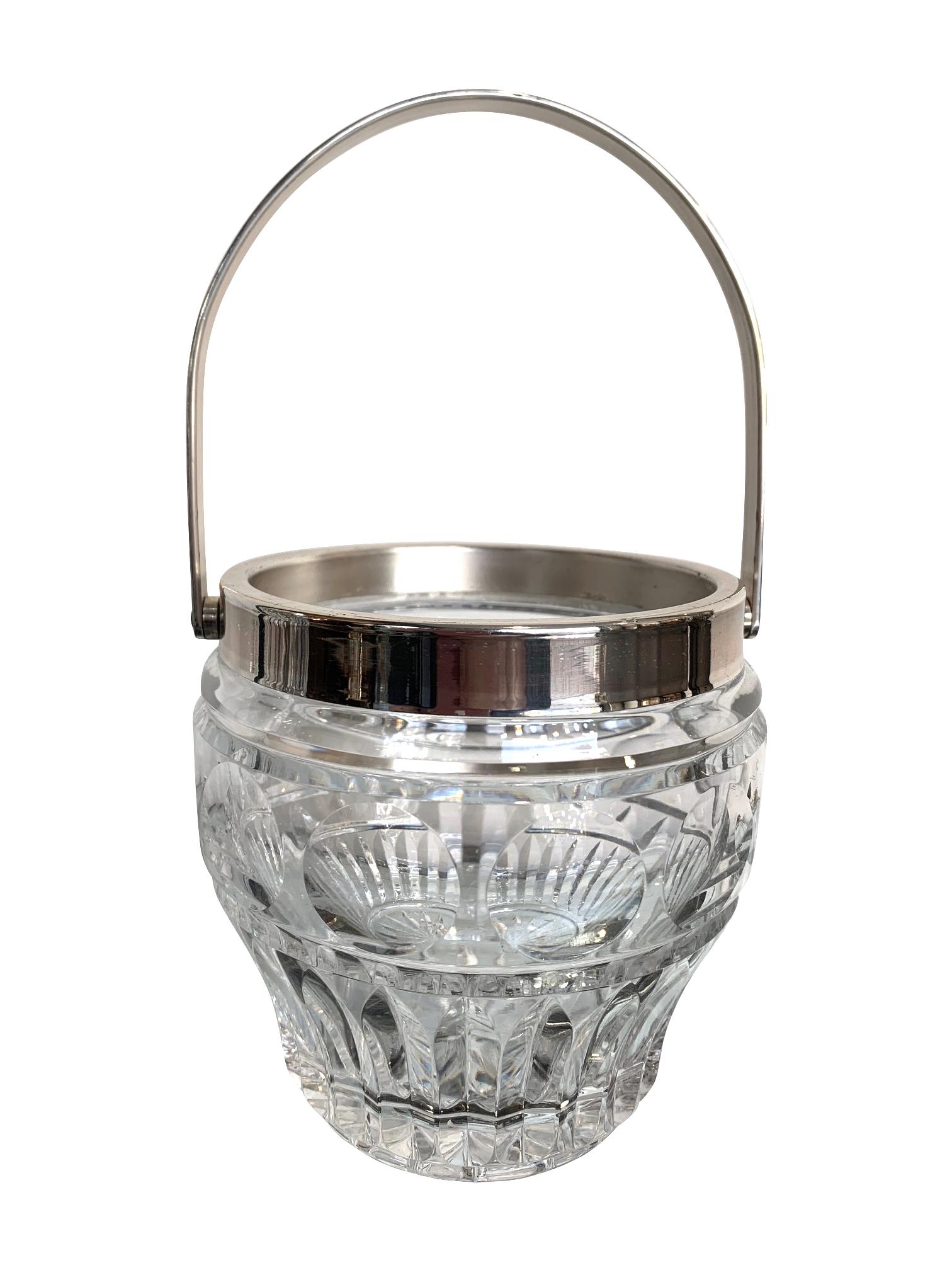 A 1950s Val Saint Lambert crystal and silver plate cocktail Shaker and matching ice bucket with handle, both with circular and faceted pattern design.