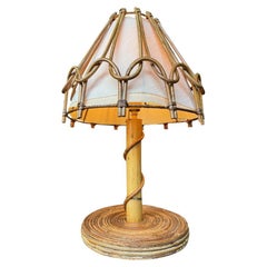A 1960s bamboo lamp by Louis Sognot with orignal bamboo and linen shade
