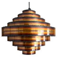 A 1960s Danish torch cut copper pendant light by Svend Aage Holm Sorensen