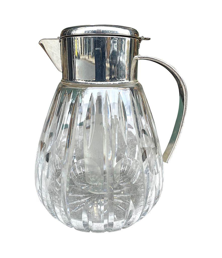 Mid-Century Modern A 1960s German crystal and silver plated lemonade jug with central ice tube For Sale