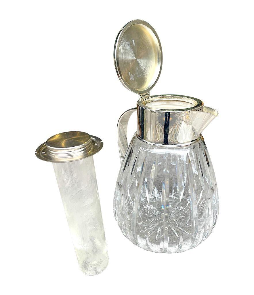 Mid-20th Century A 1960s German crystal and silver plated lemonade jug with central ice tube For Sale