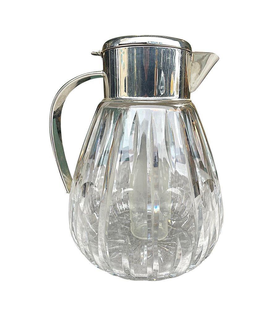 A 1960s German crystal and silver plated lemonade jug with central ice tube For Sale 1