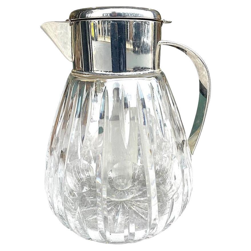 A 1960s German crystal and silver plated lemonade jug with central ice tube For Sale