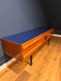 A 1960s Italian 6 drawers credenza with cobalt blue glass top