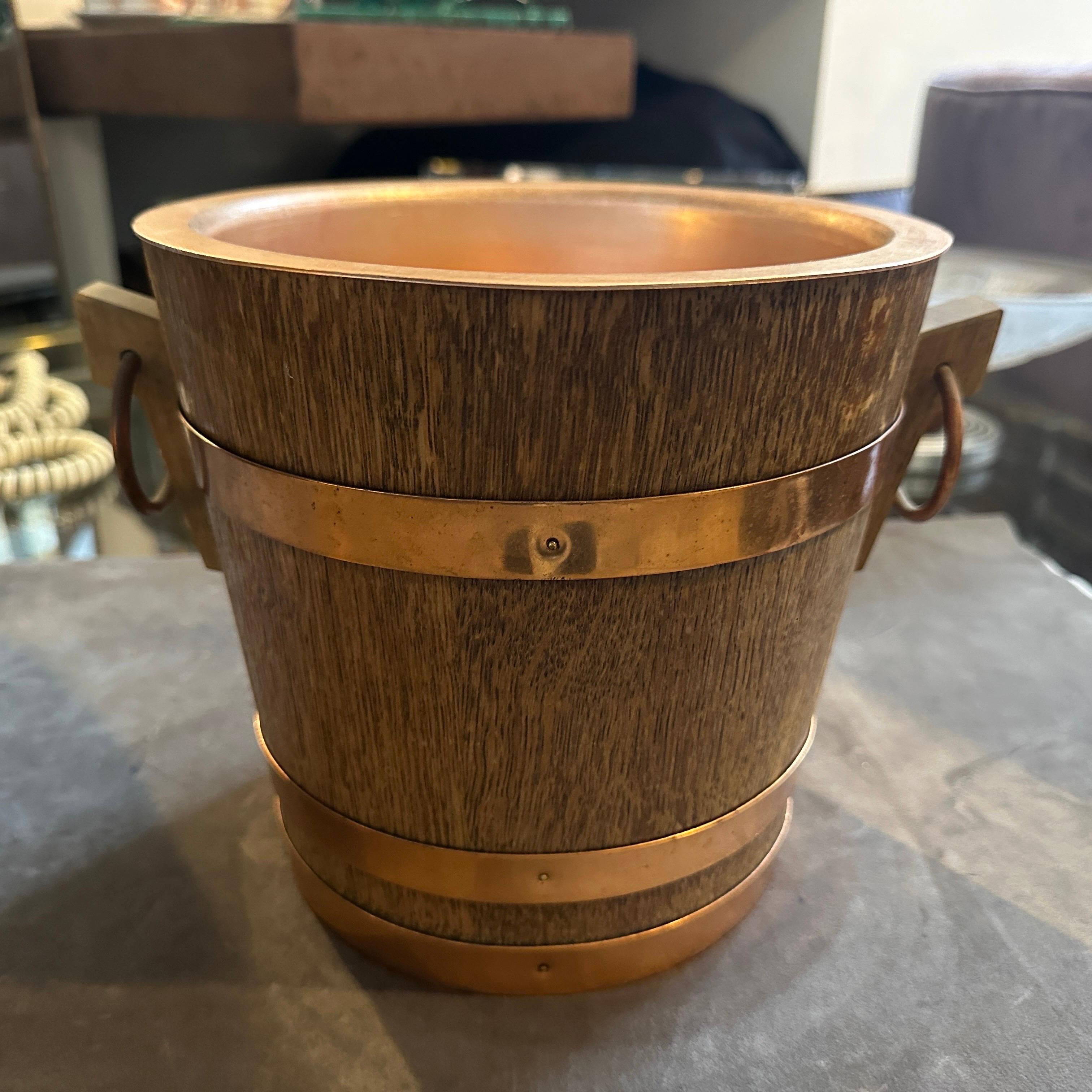 A 1960s Mid-Century Modern Oak and Copper French Wine Cooler 
An amazing oak and copper wine cooler hand-crafted in France in mid 20th century, it's in original condition with normal signs of use and age, It exhibits characteristics of the mid