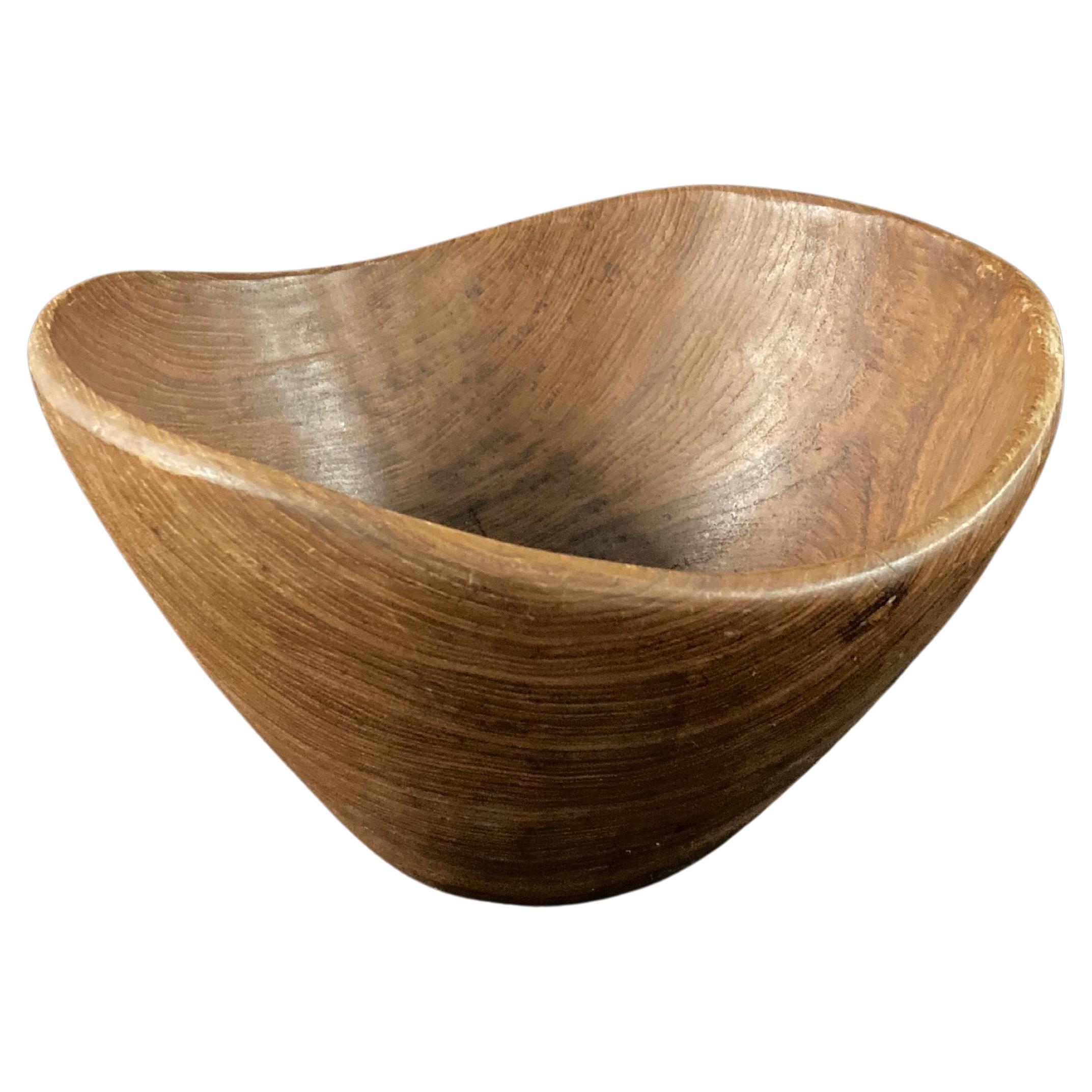 A 1960s Scandinavian teak bowl in the style of Jens Quistgaard For Sale