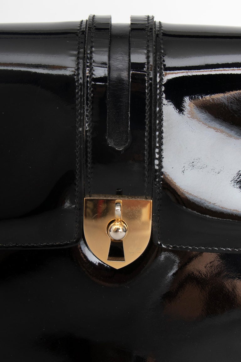 A 1960s Vintage Gucci Black Patent Leather Handbag with Gold Hardware