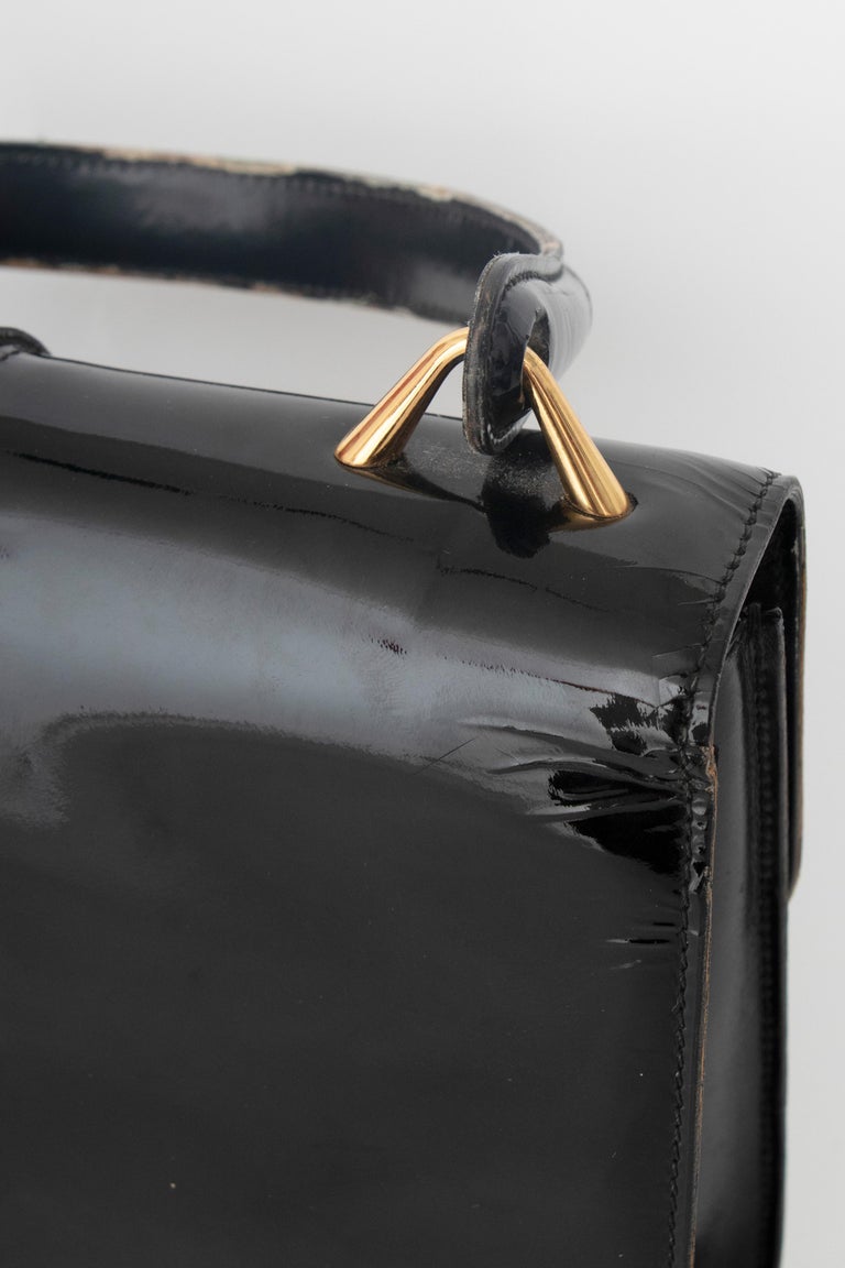 A 1960s Vintage Gucci Black Patent Leather Handbag with Gold Hardware ...