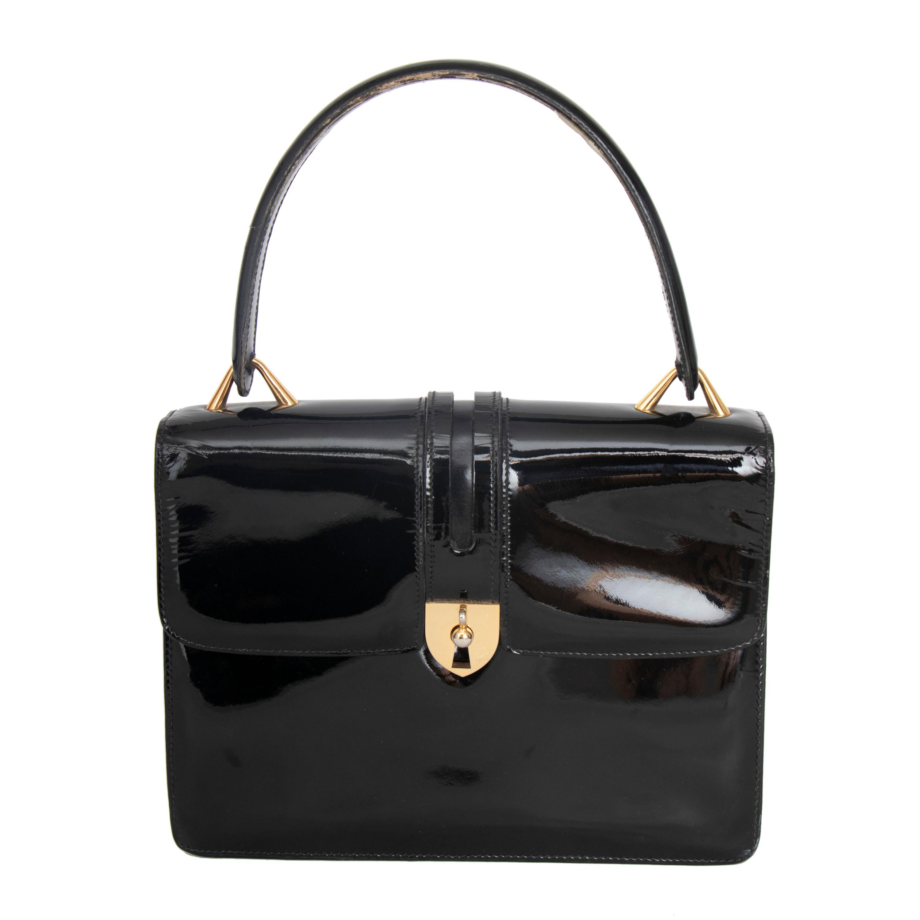 A 1960s Vintage Gucci Black Patent Leather Handbag with Gold Hardware For Sale