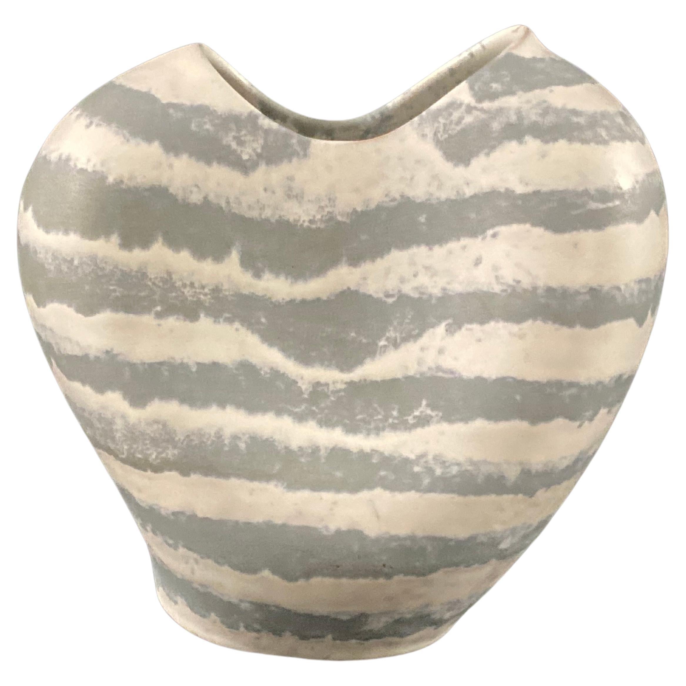 A 1960s West German ceramic vase by Carstens.

Grey and white striped vase of irregular form. Made circa 1960s. Stamped with makers mark of Carstens West Germany under. 

Carstens Tönnieshof began in 1900 but resumed post-war production sometime