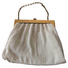 A 1960s Whiting & Davis Gold and White Mesh Hand Bag 